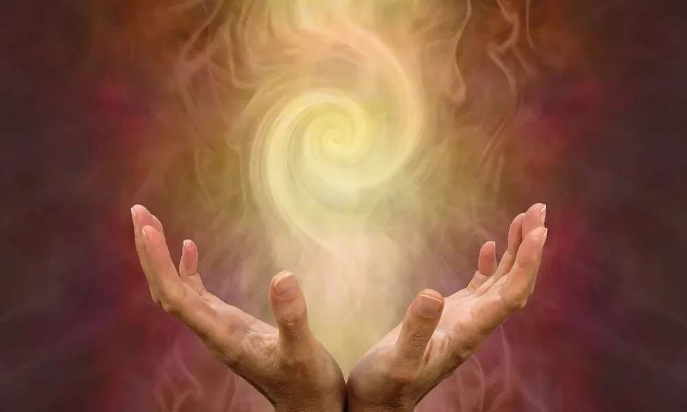 Healing hands with glowing energy